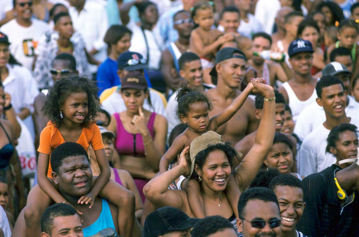 Spectators enjoying Merengue show.