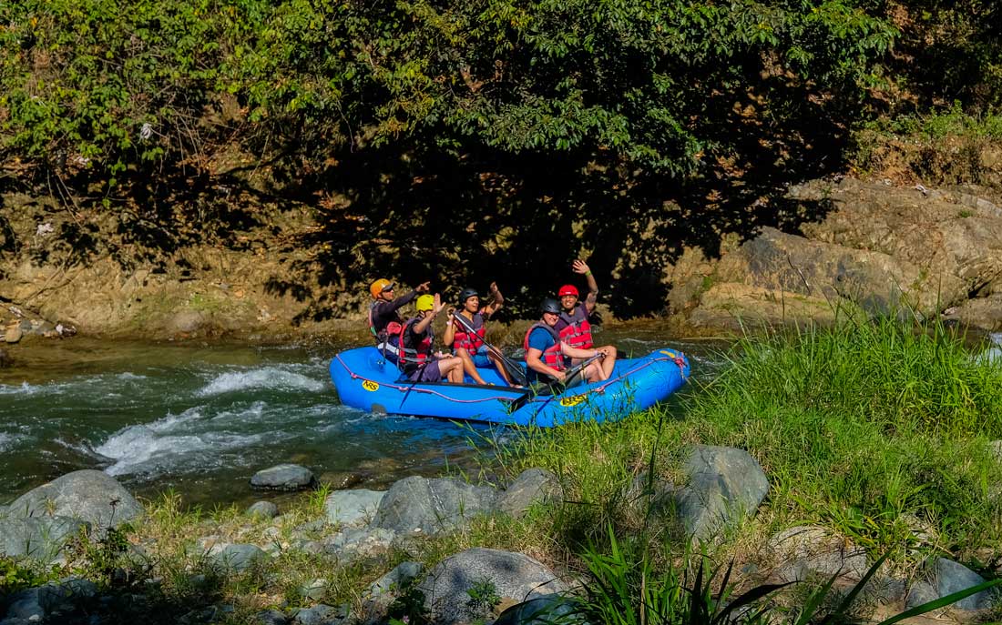 Tourist white water rafting in Dominican Republic.