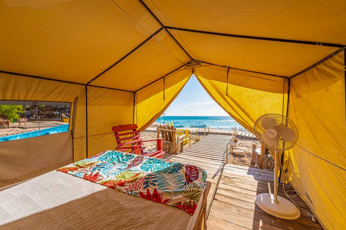 Inside tent with walkway to the beach.