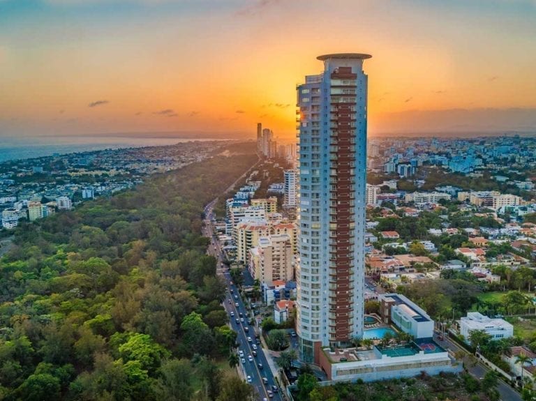 High rise building in the city at sunset.